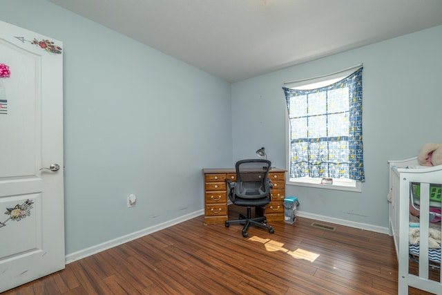 office space with dark hardwood / wood-style floors