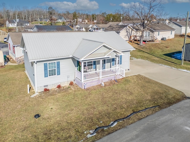 view of front facade with a porch and a front yard