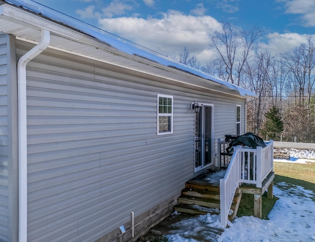 view of snow covered property