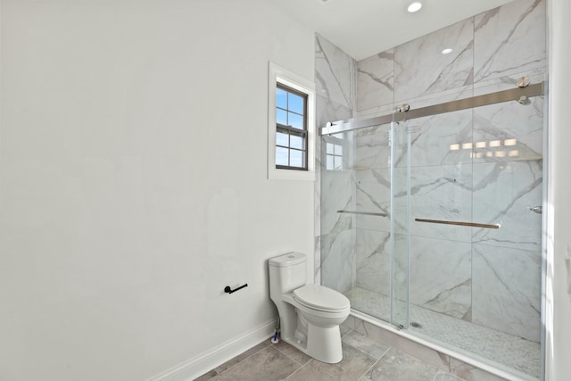 bathroom featuring toilet, a marble finish shower, baseboards, and recessed lighting