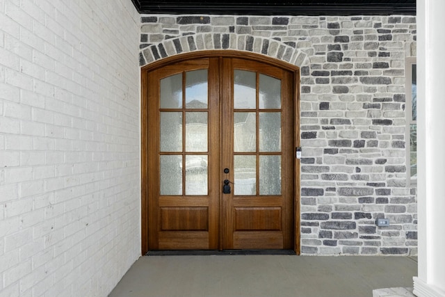 property entrance featuring french doors