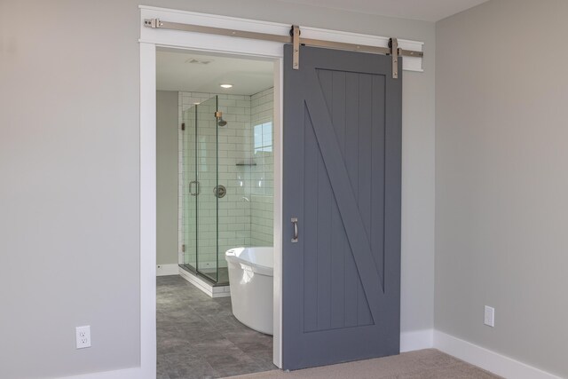 bathroom with separate shower and tub