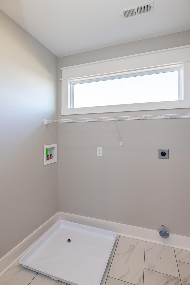 laundry area with electric dryer hookup and hookup for a washing machine