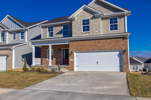 view of front of property featuring a garage, a porch, and a front yard