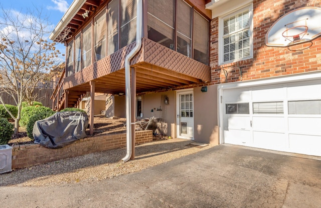 view of property exterior with a garage