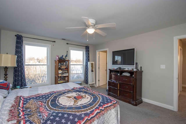 bedroom with light colored carpet and ceiling fan