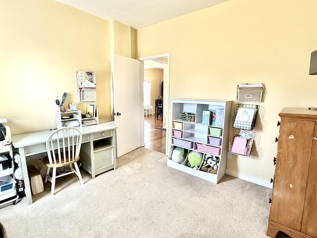 home office featuring light carpet