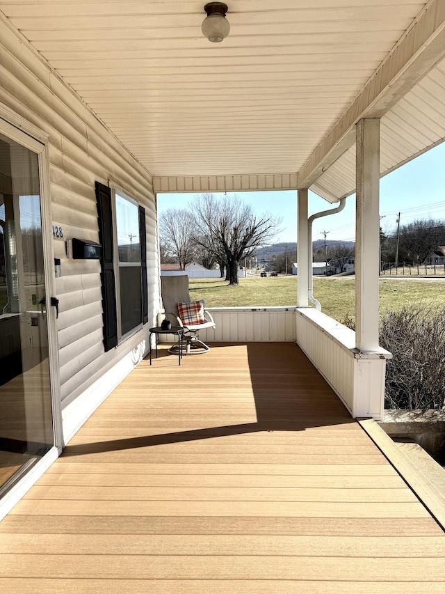 deck with covered porch