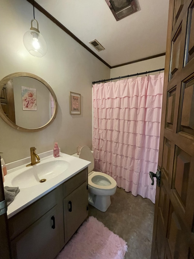 bathroom featuring vanity, crown molding, toilet, and walk in shower