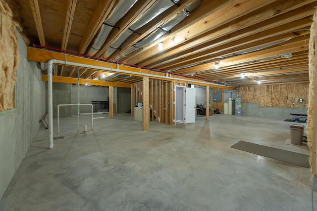 unfinished basement with secured water heater