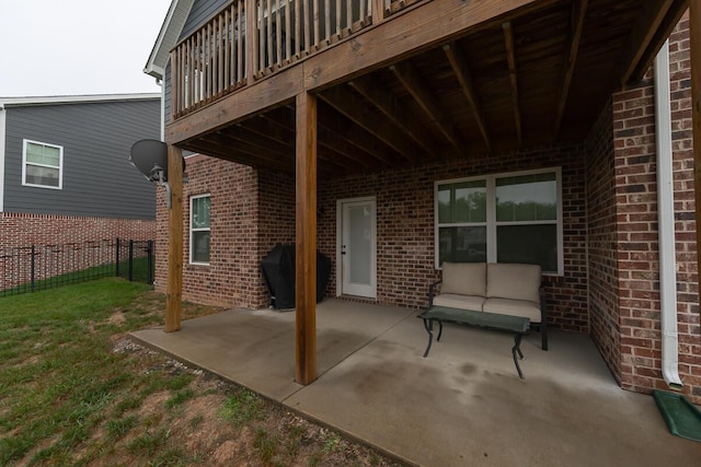 view of patio / terrace featuring fence