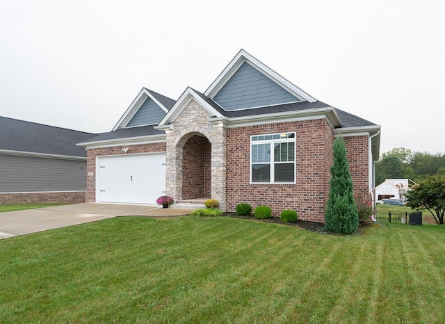 view of front of home featuring concrete driveway, brick siding, a front yard, and stone siding