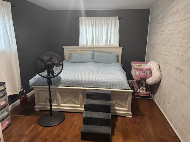 bedroom featuring dark wood-type flooring