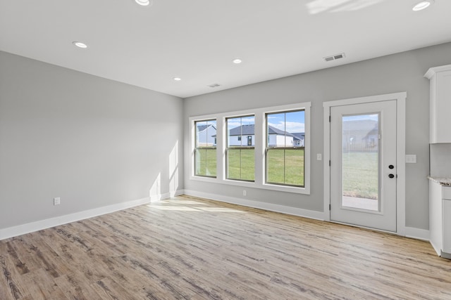 empty room featuring light wood-type flooring