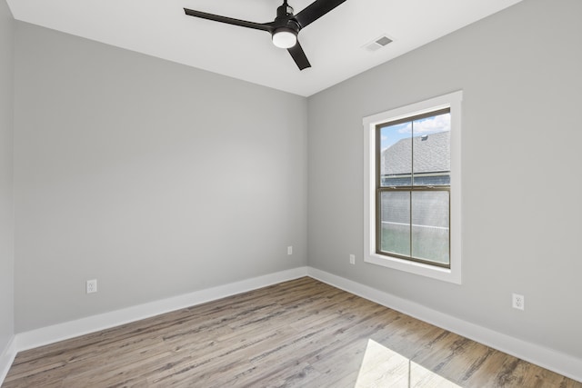 unfurnished room featuring ceiling fan and light hardwood / wood-style floors