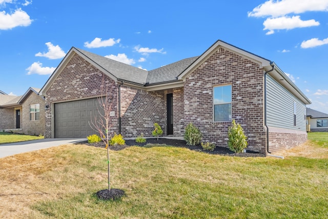 view of front of house with a garage and a front lawn