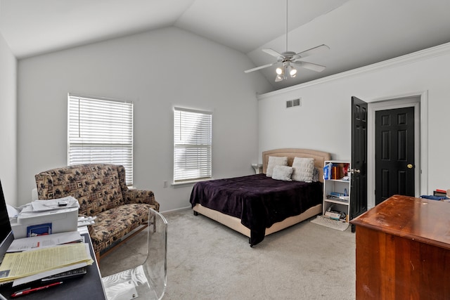 bedroom with ceiling fan, vaulted ceiling, and carpet