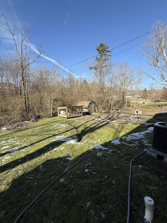 view of yard featuring central AC unit