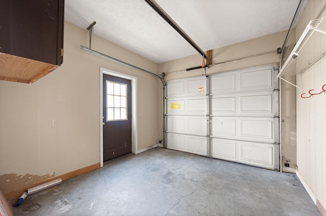 garage with baseboards