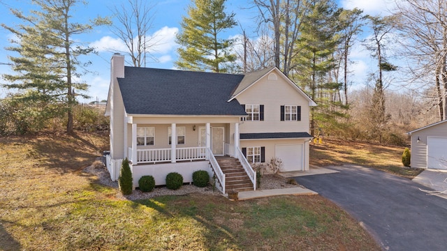 tri-level home with roof with shingles, a chimney, driveway, a porch, and a garage