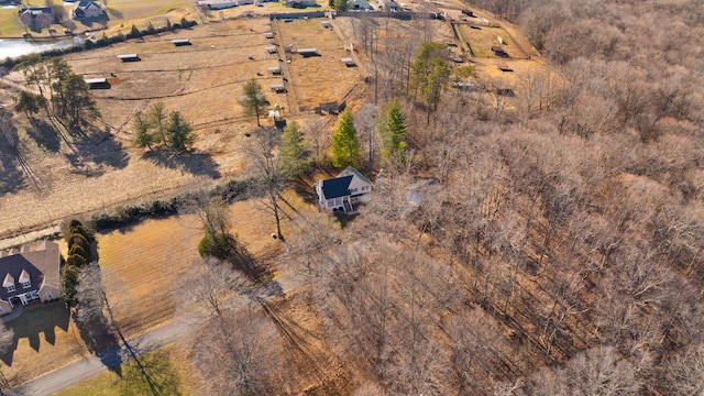 birds eye view of property featuring a rural view