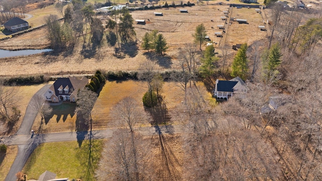 aerial view with a water view and a rural view