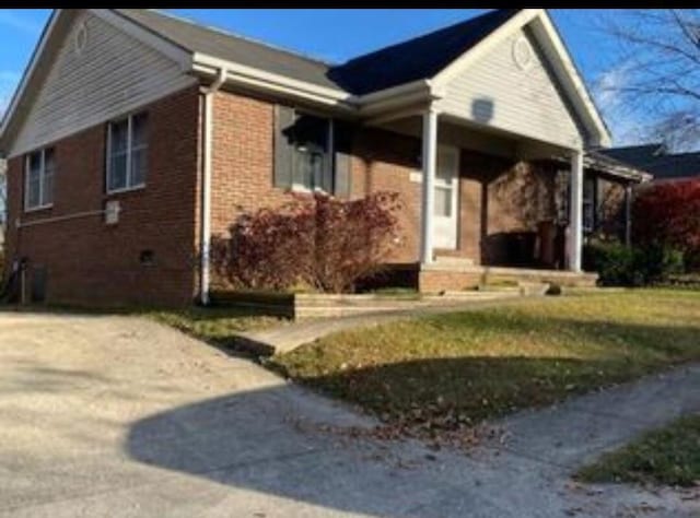 view of front of home with brick siding