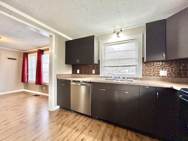 kitchen with sink, light hardwood / wood-style flooring, dishwasher, range, and tasteful backsplash