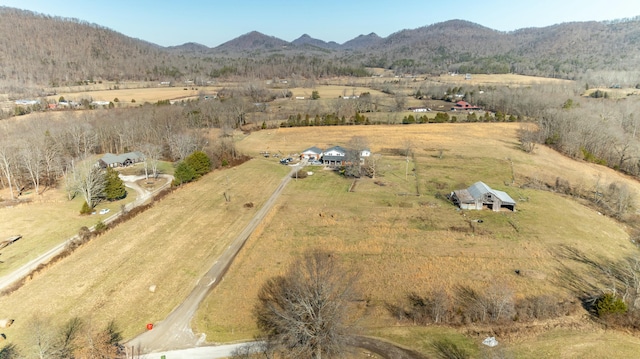 bird's eye view with a mountain view and a rural view