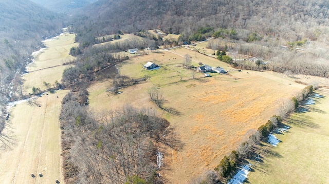 birds eye view of property featuring a rural view