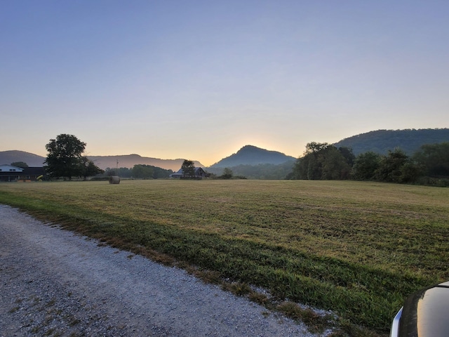 property view of mountains with a rural view