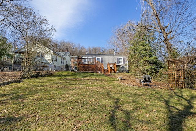 view of yard featuring a deck