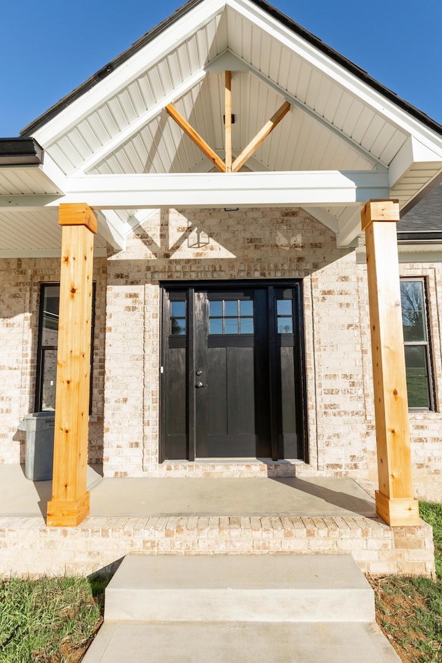 doorway to property with covered porch