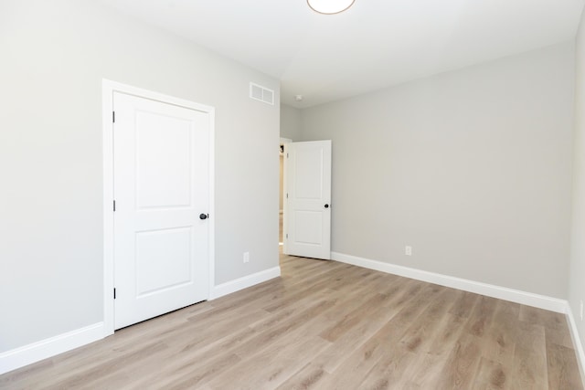 unfurnished bedroom with light hardwood / wood-style flooring