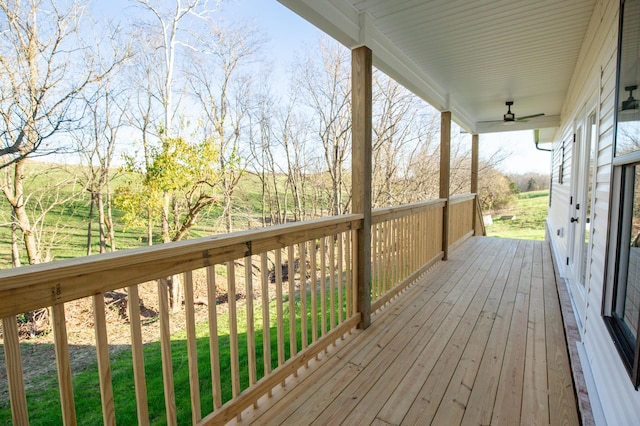 wooden terrace with ceiling fan