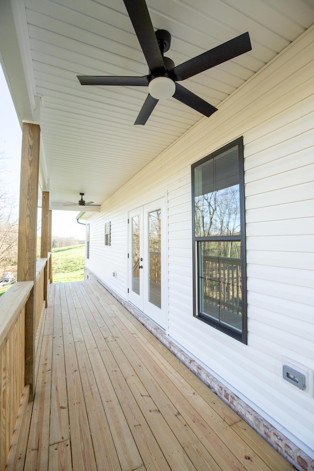 wooden terrace featuring french doors