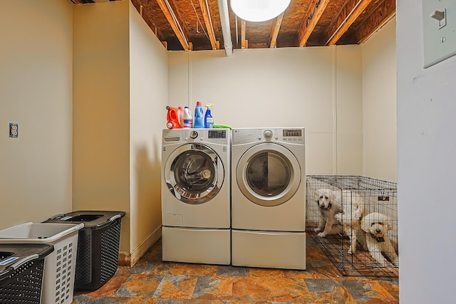 washroom with separate washer and dryer