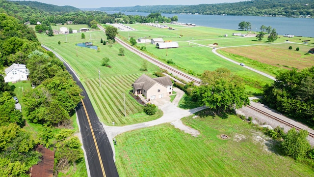 drone / aerial view featuring a water view and a rural view