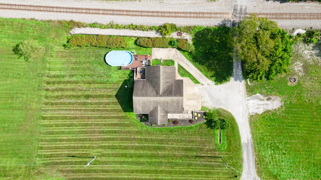 birds eye view of property featuring a rural view