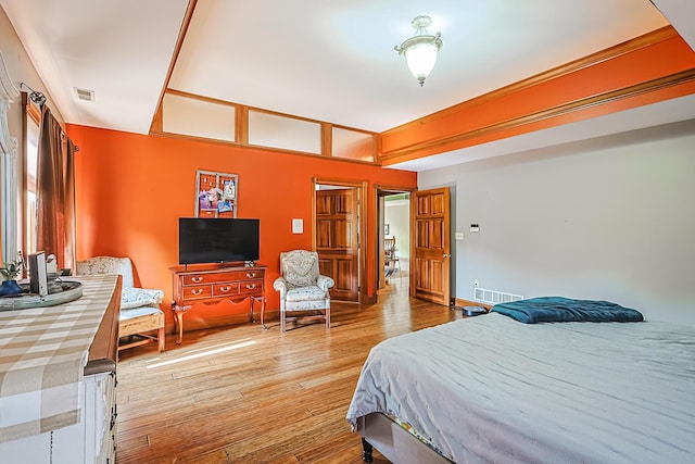 bedroom with light hardwood / wood-style floors