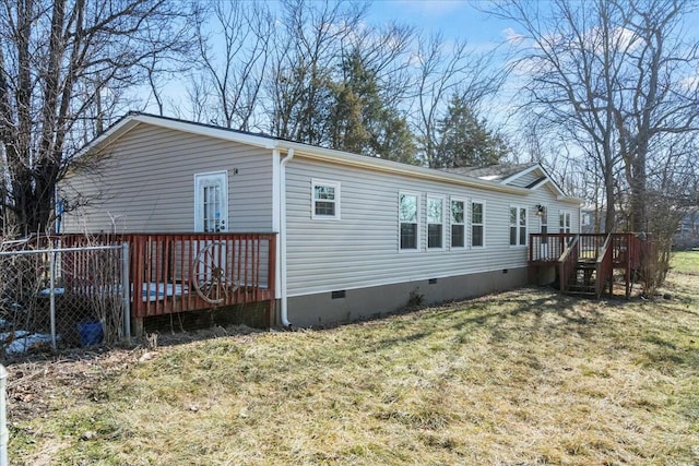 exterior space with a yard and a deck