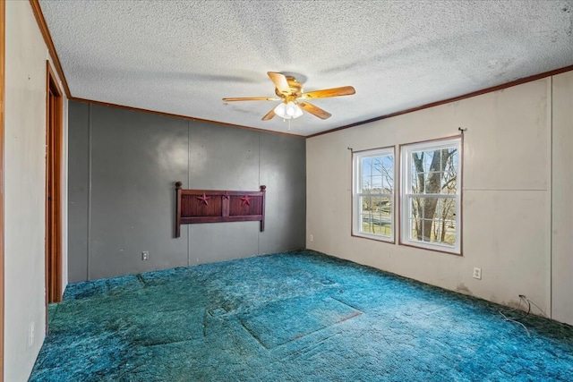 unfurnished room with crown molding, carpet, a textured ceiling, and ceiling fan