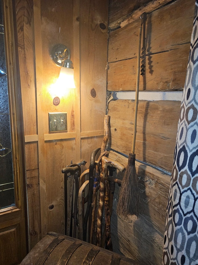 room details featuring wood walls