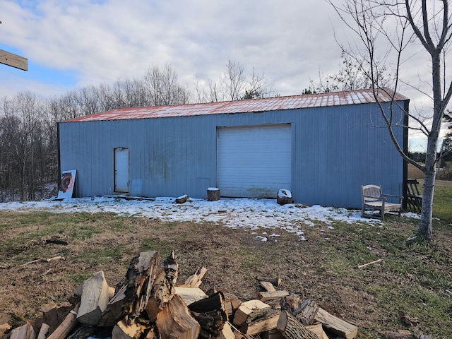 view of snow covered garage