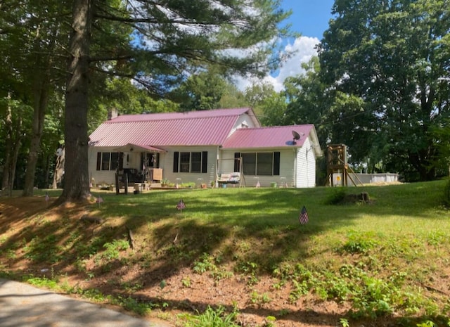 ranch-style home with a front lawn