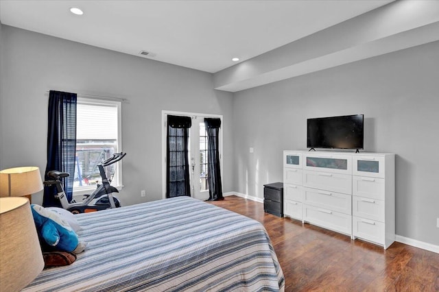 bedroom featuring dark wood-type flooring