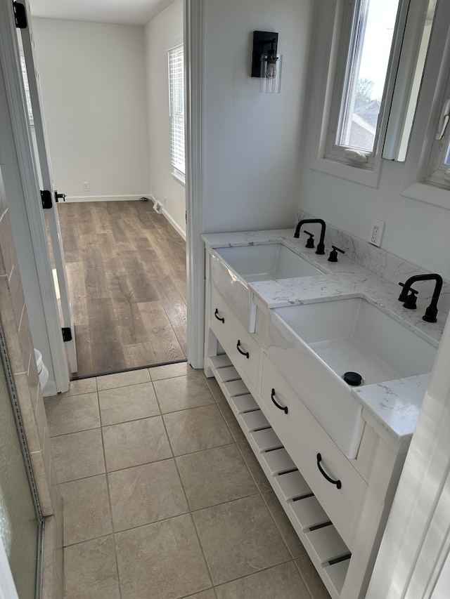 bathroom with vanity and tile patterned floors