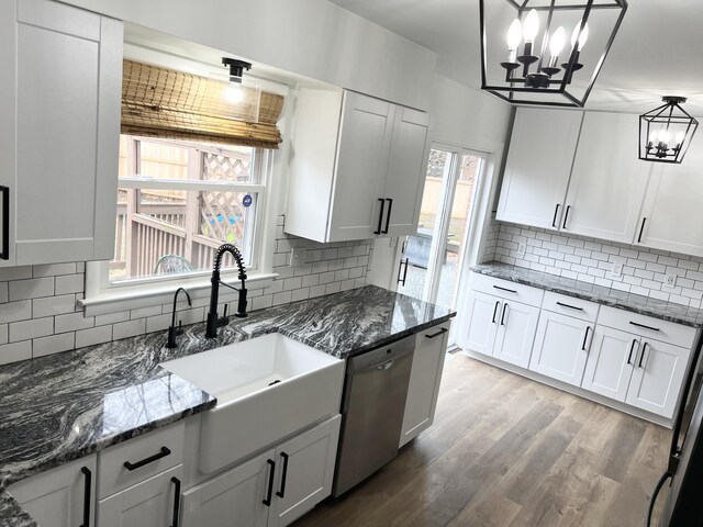 interior space with white cabinetry, butcher block counters, pendant lighting, and dark hardwood / wood-style flooring