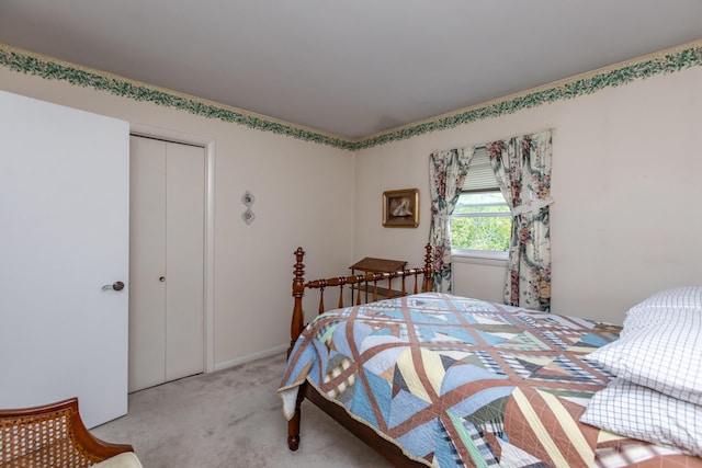 bedroom with carpet flooring and a closet