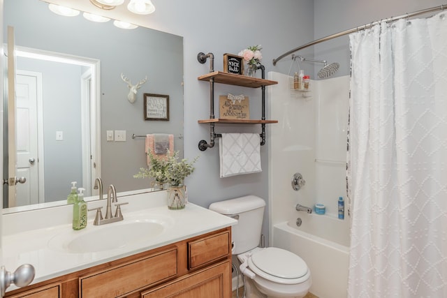 full bathroom featuring toilet, vanity, and shower / bathtub combination with curtain